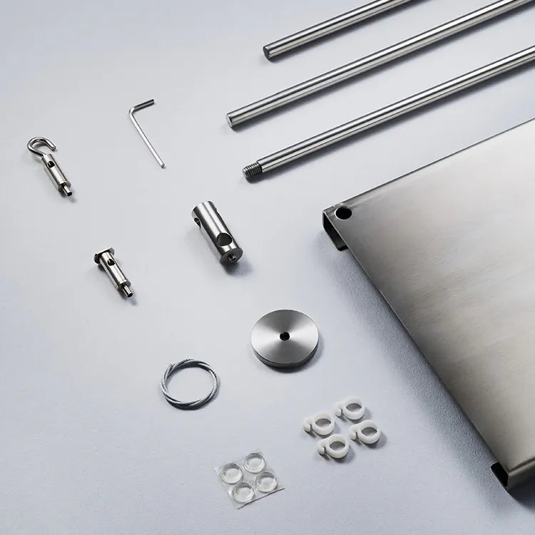 Set of metal components on a light gray background