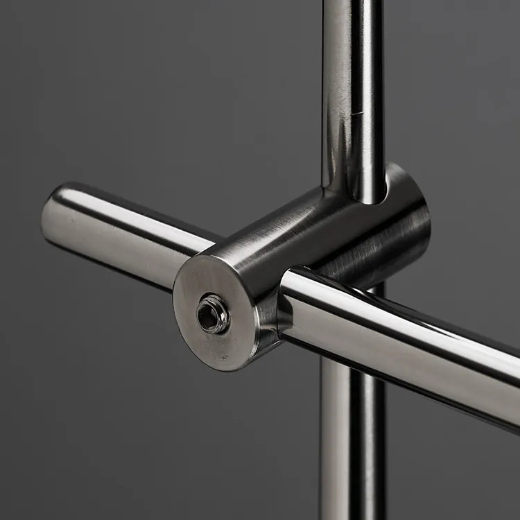 Close-up of a metallic door handle on a dark background