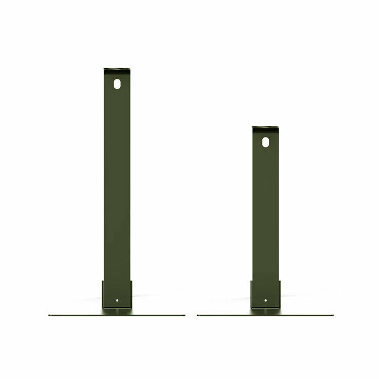 Two green metal brackets on a white background